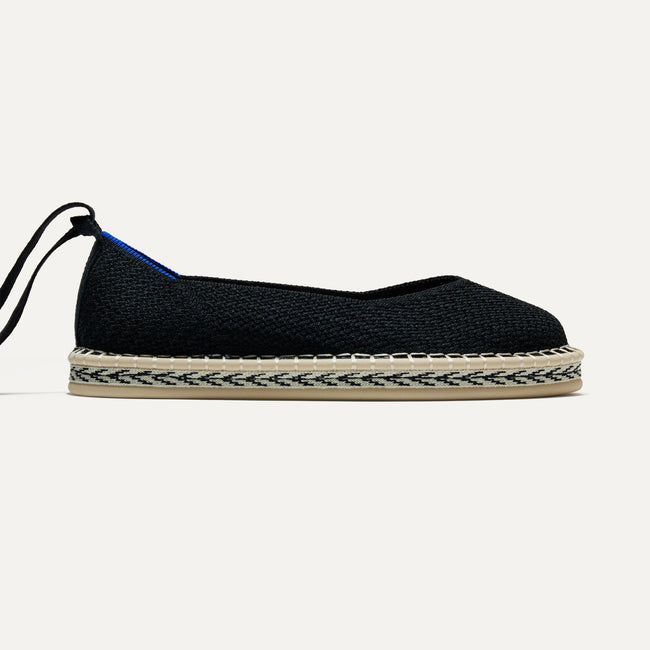 The Espadrille in Black, shown from the side. 