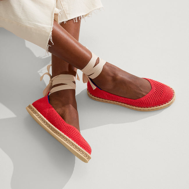Model wearing The Espadrille in Red Hot. 