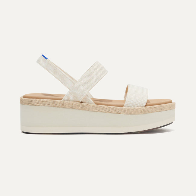 The Lightweight Wedge Sandal in Salt shown from the side. 