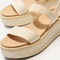 Close up of the knit rand of The Lightweight Wedge Sandal in Salt, shown in diagonal view. 