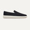 The Ravello Slip On Sneaker in Black shown from the side. 