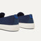 Close up of the heel of The Ravello Slip On Sneaker in Dark Navy, with Rothy's signature blue halo. 