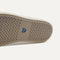 Outsole of The Ravello Slip On Sneaker in Portobello Brown shown from below, in diagonal view. 