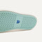 Outsole of The Ravello Slip On Sneaker in Whitecap shown from below, in diagonal view. 