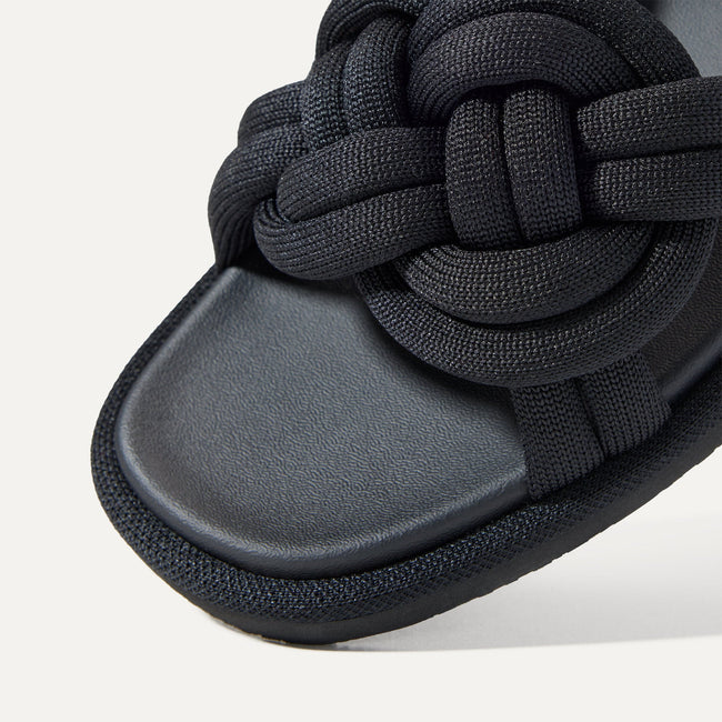 Close up of the vamp of The Summer Sandal in Black. 