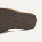 Close up of the outsole of The Summer Sandal in Golden Sun. 