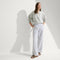 Alternate view of a model wearing The Summer Sandal in Safari.