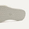Close up of the outsole of The Summer Sandal in White Sand. 