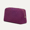 The Universal Pouch in Cranberry Plum shown at a diagonal view from the right.