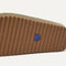 Close up of the outsoles of The Casual Clog in Toffee Raffia-Knit.