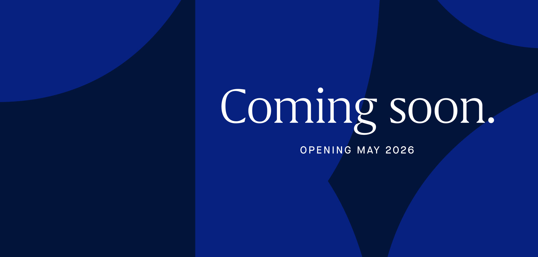 Coming soon announcement with a blue geometric design