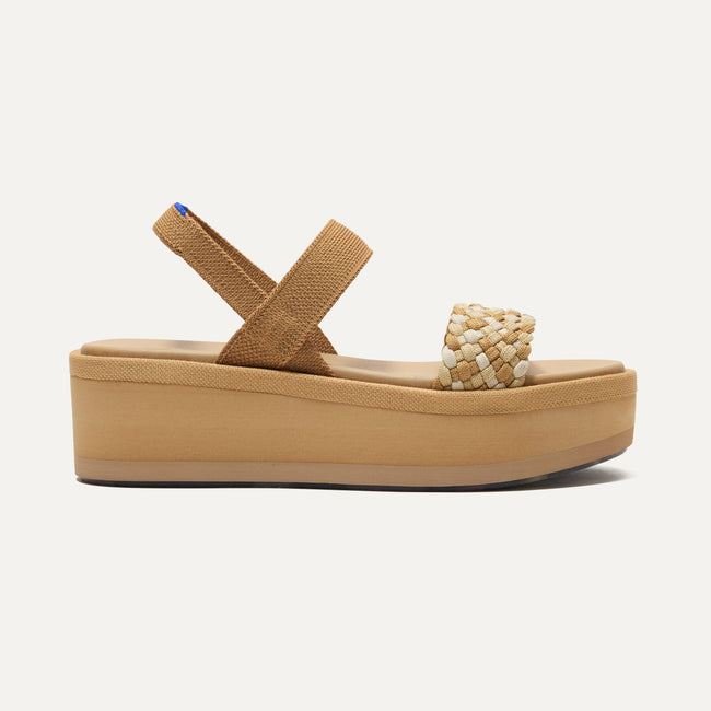 The Lightweight Wedge Sandal in Beach Sand Woven shown from the side.