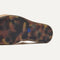 Close up of the outsole of The Lightweight Wedge Sandal in Beach Sand Woven.