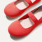 Close up of the toe and vamp of The Kids Mary Jane in Glamour Red.