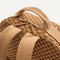 A close up of The Backpack in Hazelnut showing the hidden zipper closure.