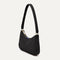 The Mini Shoulder Bag in Black Sand shown from the side.