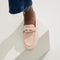 hover | Model wearing The Loafer Mule in Blush Pink.