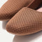 Close up of The Max Square in Pecan Micro Check, shown in diagonal view.