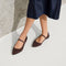 hover | Model wearing The Point Mary Jane II in Chocolate. 