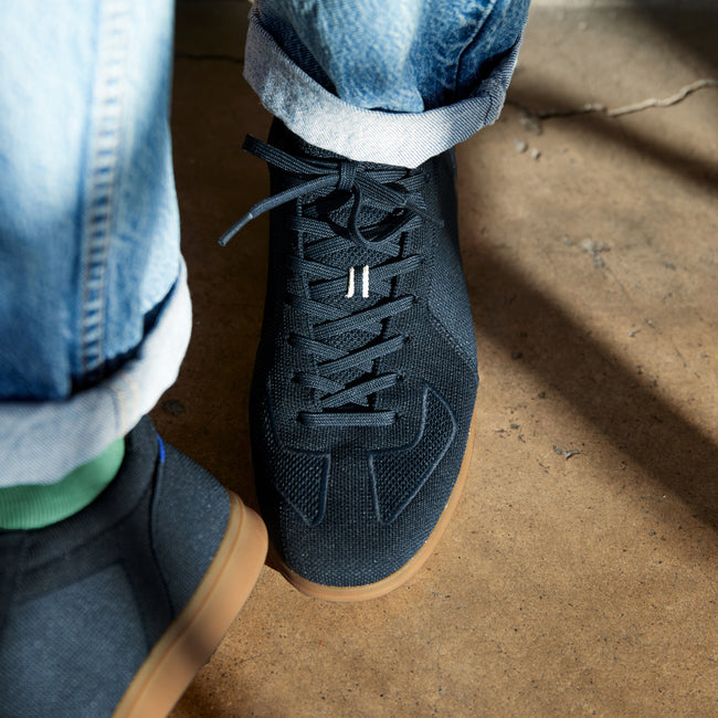 hover | Model wearing The RS01 Sneaker in Navy.