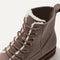 Close up of the stretch ankle panels and shearling lining of The Cozy Laced Lug Boot in Sparrow.
