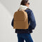 hover | Model wearing The Backpack in Hazelnut on her back.