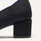 Closeup of the heel on The Mary Jane Heel in Black.
