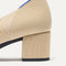 Closeup of the heel on The Mary Jane Heel in Cream Captoe.