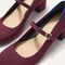 The toe and vamp of The Mary Jane Heel in Wine Red, in diagonal view.