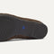 The sole of The Max Square Mary Jane in Cinnamon Crochet shown in diagonal view.