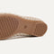 The sole of The Max Square Mary Jane in Frappe Basketweave shown in diagonal view.