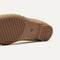 The sole of The Max Square Mary Jane in Golden Crisp Basketweave shown in diagonal view.