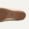 The sole of The Max Square Mary Jane in Pearl Bouclé shown in diagonal view.