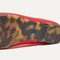 The sole of The Max Square Mary Jane in Red Hot shown in diagonal view.
