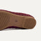 The sole of The Max Square Mary Jane in Wine Red shown in diagonal view.