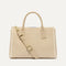 PDP |The Classic Handbag in Soft Sesame shown from the front. 