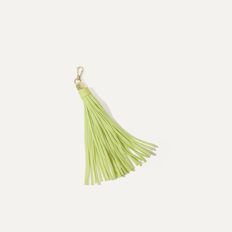 PLP |The Tassel Clip in Neon Lime shown from the front. 