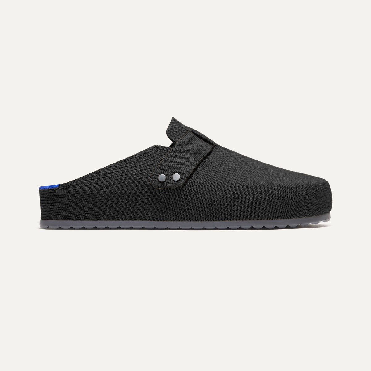 side | The Men's Clog in Soft Black shown from the side. 