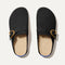 The Buckle Clog in Soft Black Bouclé shown from the top. 