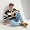Alternate view of a model wearing The Ravello Boat Shoe in Nautical Brown.