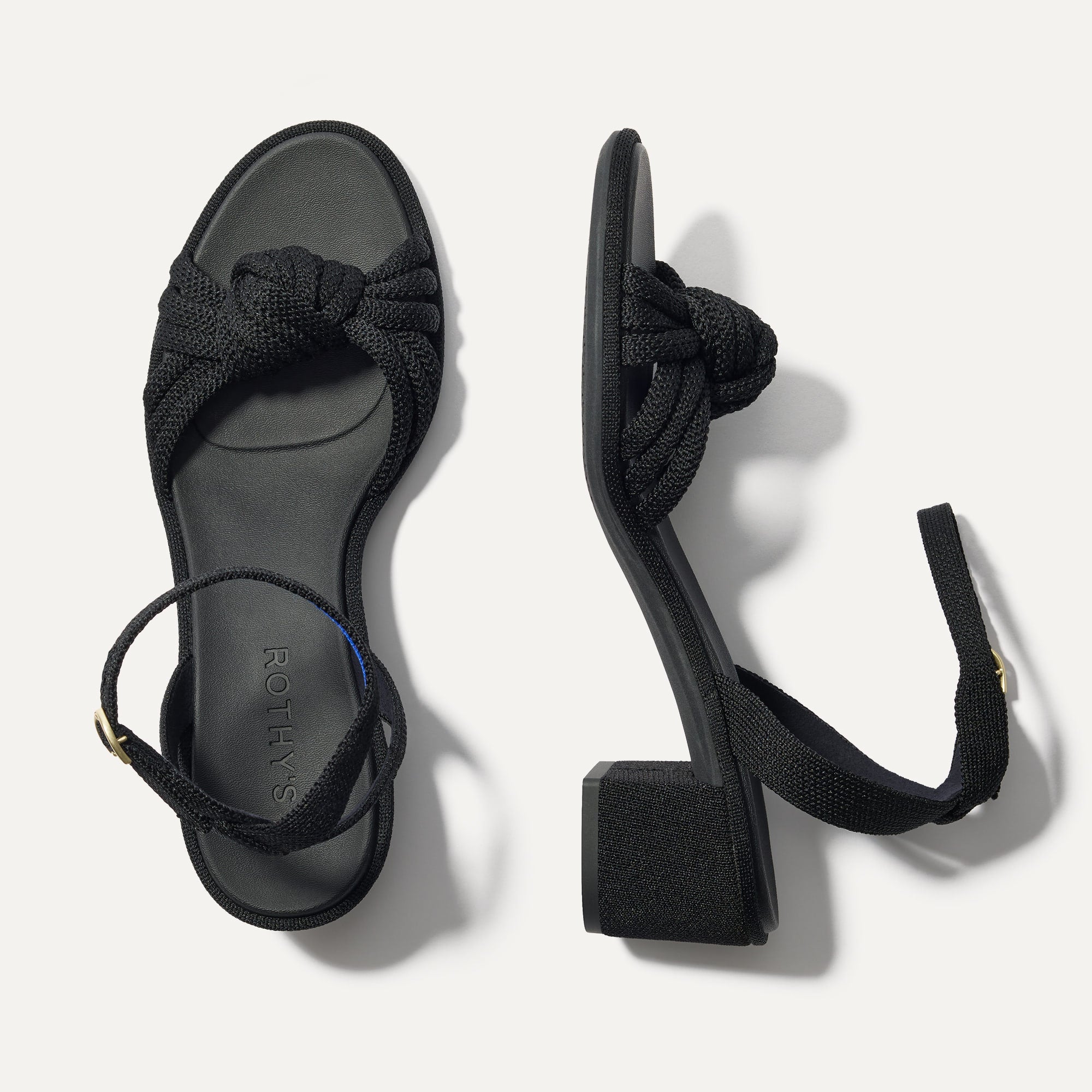 Rothy's The Knot Sandal in black recycled knit, overhead studio shot showing 2-inch block heel