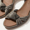 Close up of the knot detail of The Knot Sandal in Silver Sand.