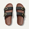 The Buckle Slide Sandal in Black shown from the top.