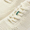 Close up of the laces of The Court Sneaker in Birdie. 