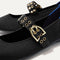 Close up of the buckle hardware and grommets on the straps of The Ballet Mary Jane in Black. 