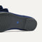 The sole of The Bow Point II in Deep Navy shown in diagonal view. 