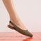 hover | Model wearing The Almond Slingback in Butterscotch Stripe.