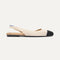 Side view of The Almond Slingback in Conch Captoe.