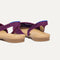 Close up of the heel The Almond Slingback in Plum Mesh, with Rothy's signature blue halo.