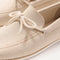Close up of the vamp and knotted detail on The Boat Shoe in Sea Foam.